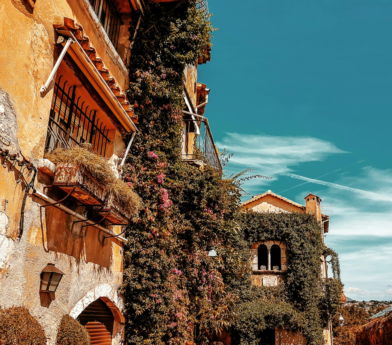 brown concrete building under blue sky during daytime